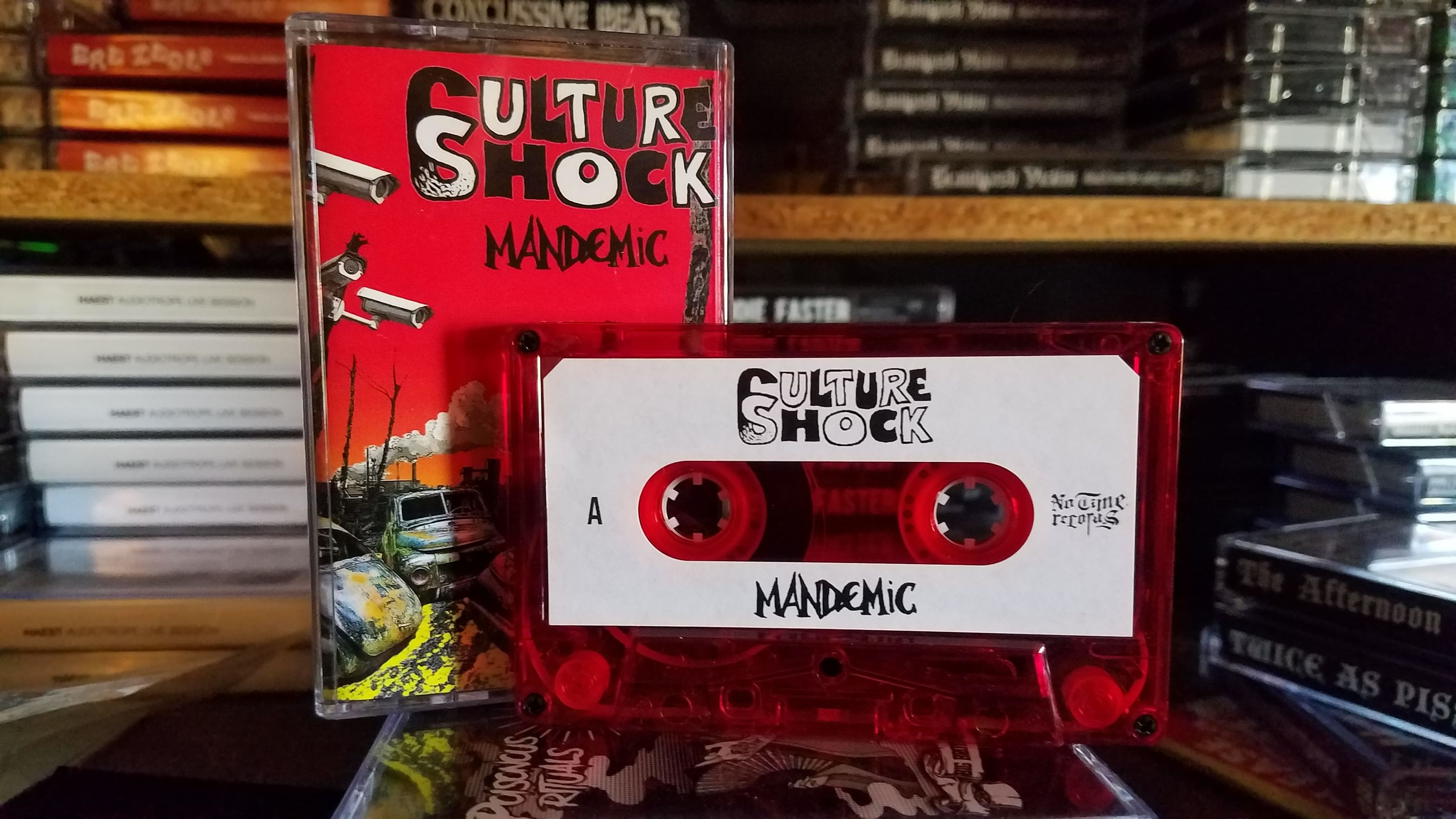 Culture Shock - Mandemic Cassette - Clear Red - Click Image to Close