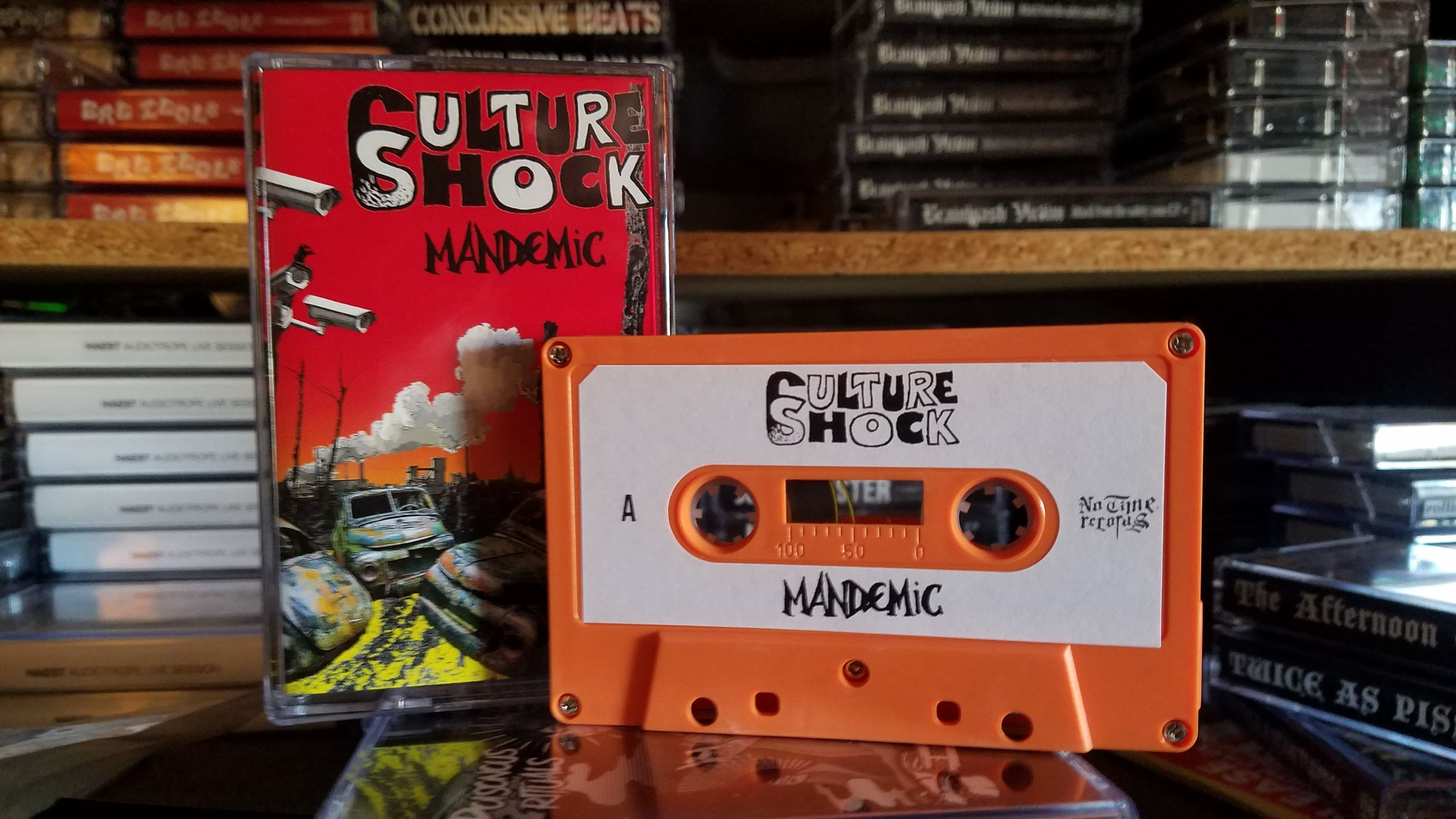 Culture Shock - Mandemic Cassette - Orange