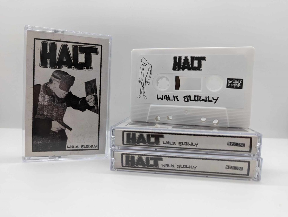 HALT - Walk Slowly Cassette (WHITE)